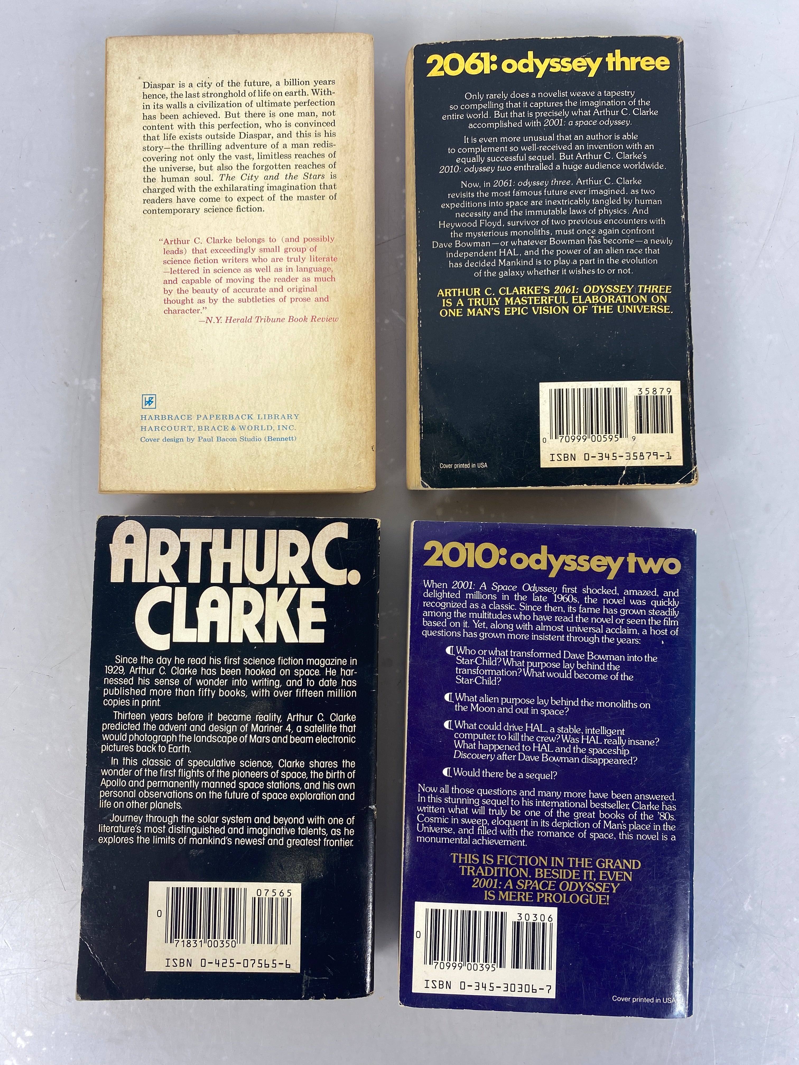 Bundle of 4 Arthur C. Clarke's Science Fiction Paperbacks (1956 - 1989)